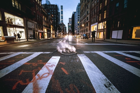 A crosswalk in a city's downtown.